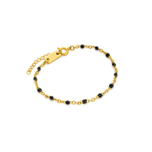 pulseira mulher fina dourada com pedras pretas